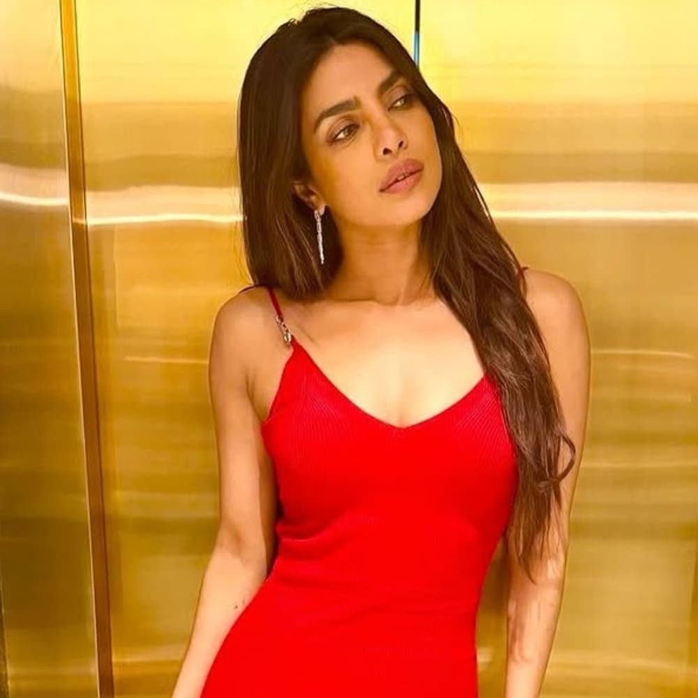 Warning: Priyanka Chopra in red Versace slip dress worth Rs 2,04,400 is flammable and ...  Warning: Priyanka Chopra in red Versace slip dress worth Rs 2,04,400 is flammable and ...
