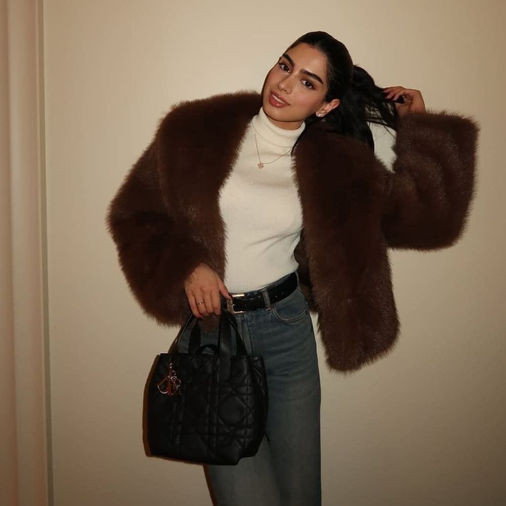 Khushi Kapoor nails winter fashion in a white turtleneck top, brown fur jacket, and a c...