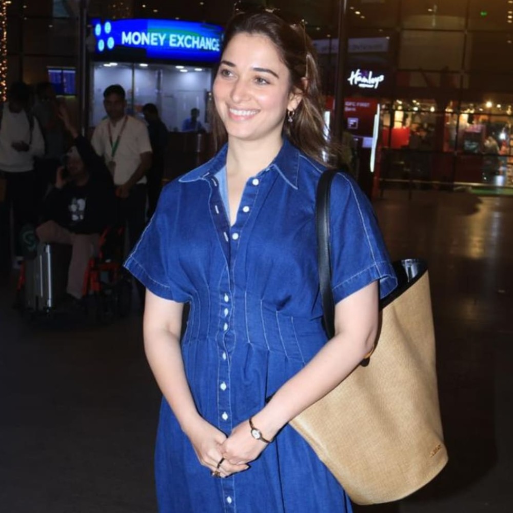 Tamannaah Bhatia styles a denim maxi dress with Rs 12 lakh watch for flawless travel-re... Tamannaah Bhatia styles a denim maxi dress with Rs 12 lakh watch for flawless travel-re...