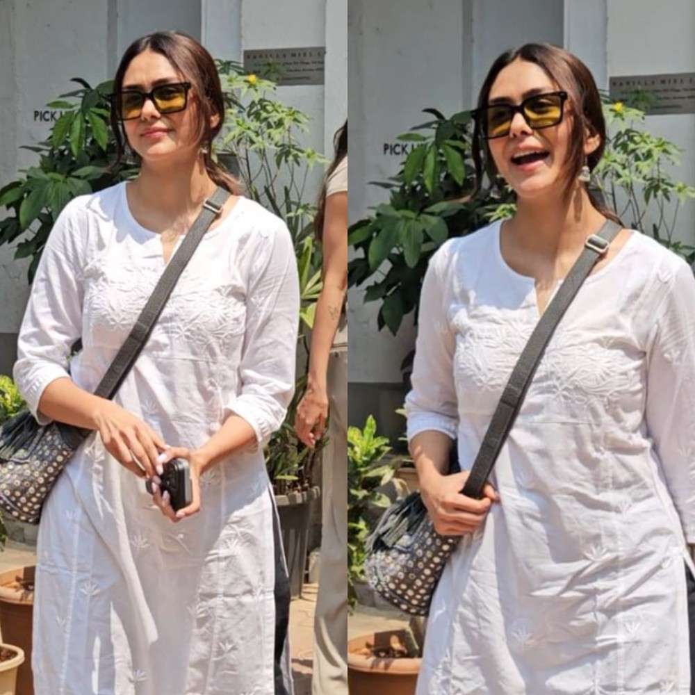 Mrunal Thakur adds jhumkas and sneakers to a kurti-jeans combo, balancing tradition wit...