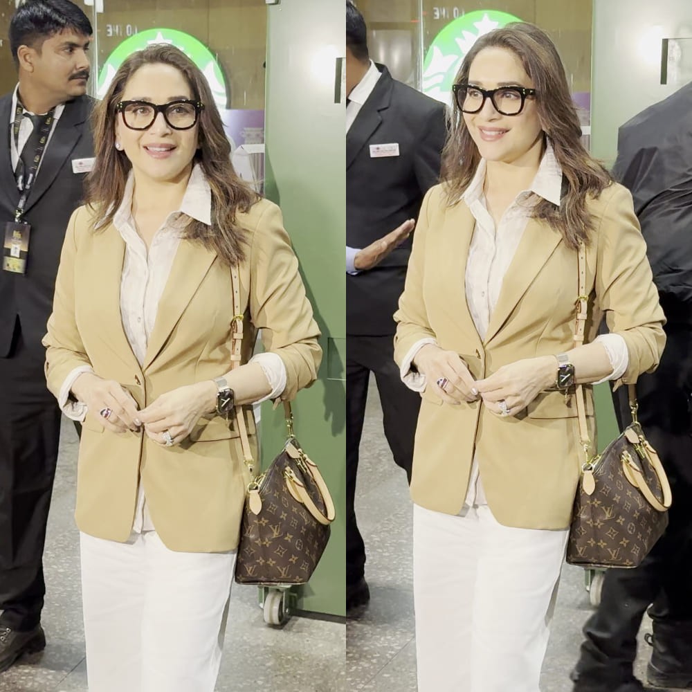 Madhuri Dixit elevates her neutral-toned airport aesthetic with Louis Vuitton bag worth...