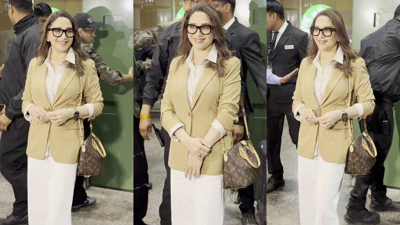 Madhuri Dixit elevates her neutral-toned airport aesthetic with Louis Vuitton bag worth Rs 1.77 Lakh. PC: Bablu
