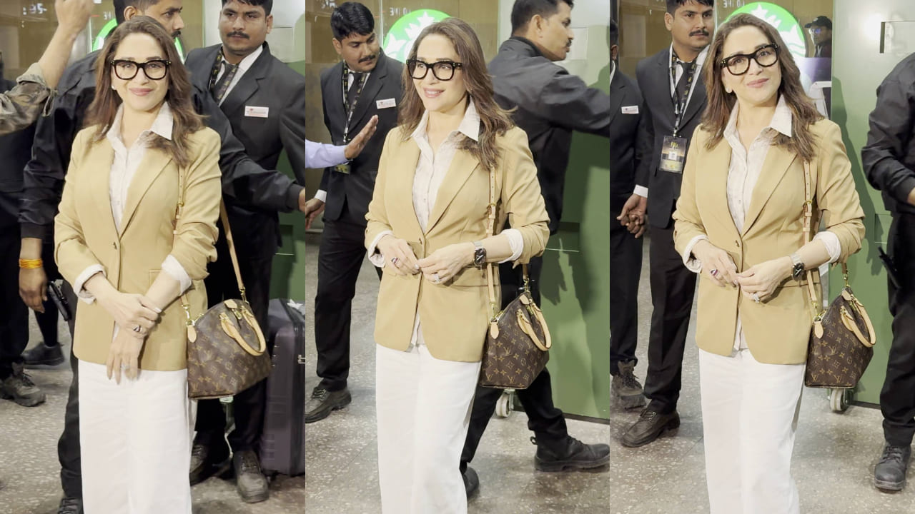 Madhuri Dixit elevates her neutral-toned airport aesthetic with Louis Vuitton bag worth Rs 1.77 Lakh. PC: Bablu