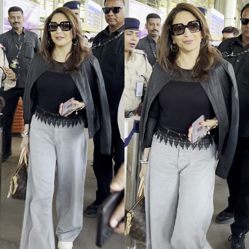 Madhuri Dixit adds posh touch to her leather-jacket airport ensemble with Louis Vuitton...