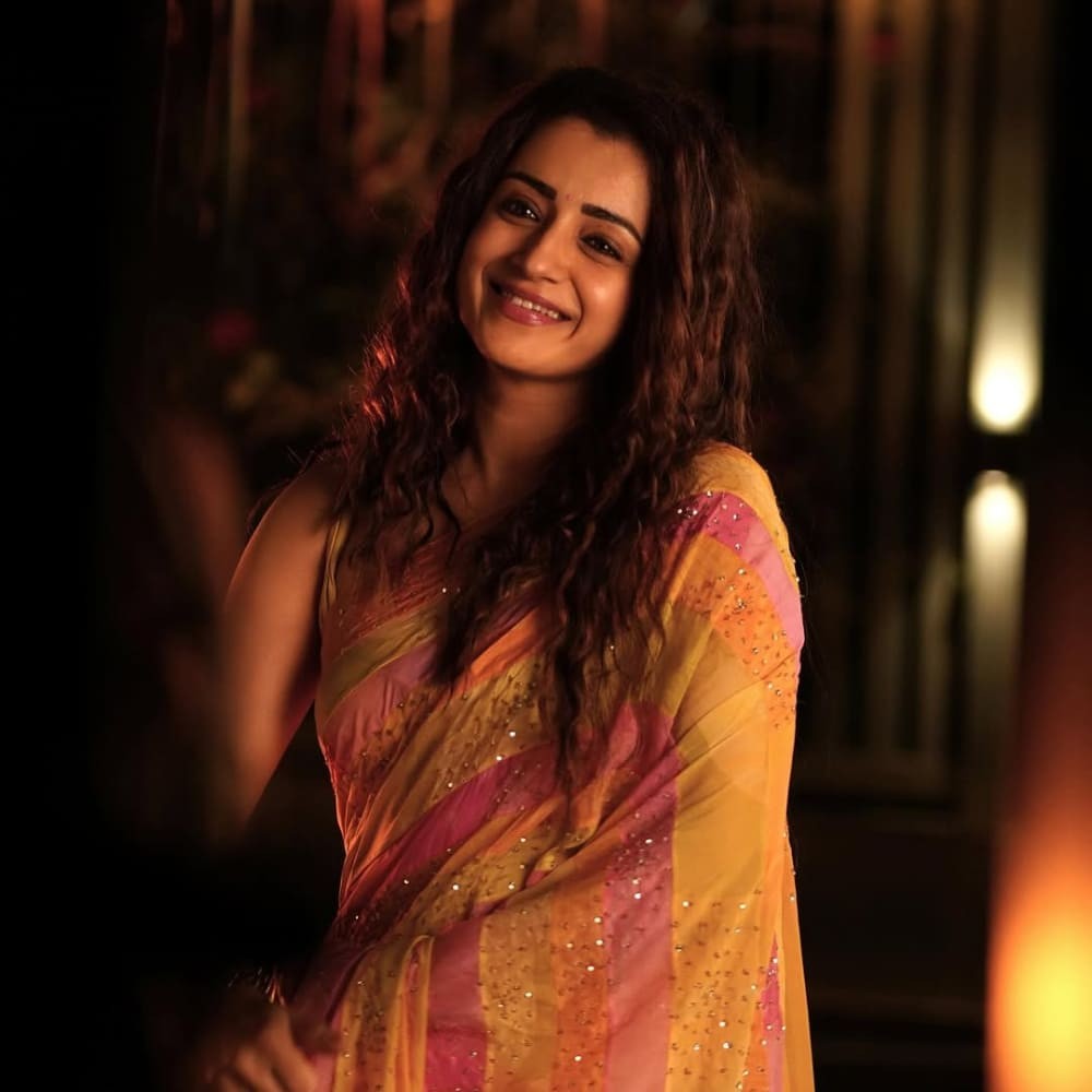 Trisha Krishnan's curly hair look in new stills from Ajith Kumar's Good Bad Ugly exudes carefree vibes, leaving fans in awe
