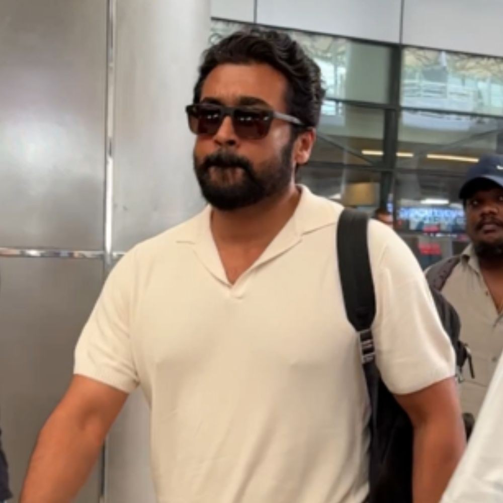 Watch: Suriya turns heads with uber cool look ft Armani sunglasses worth Rs 15K as he gets mobbed by fans at Hyderabad airport