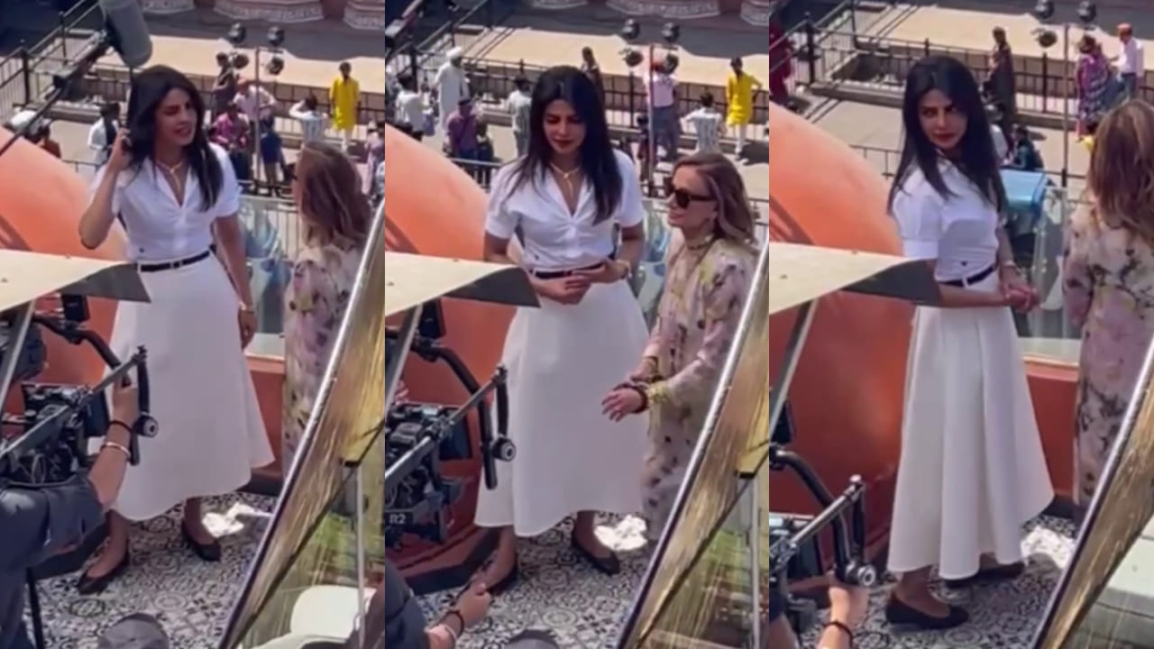 Priyanka Chopra’s version of business casual includes a shirt and midi-skirt combo. APH Images 