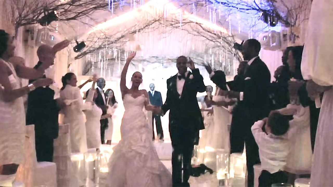 Beyoncé and Jay-Z at their wedding [Image via Beyoncé/YouTube]