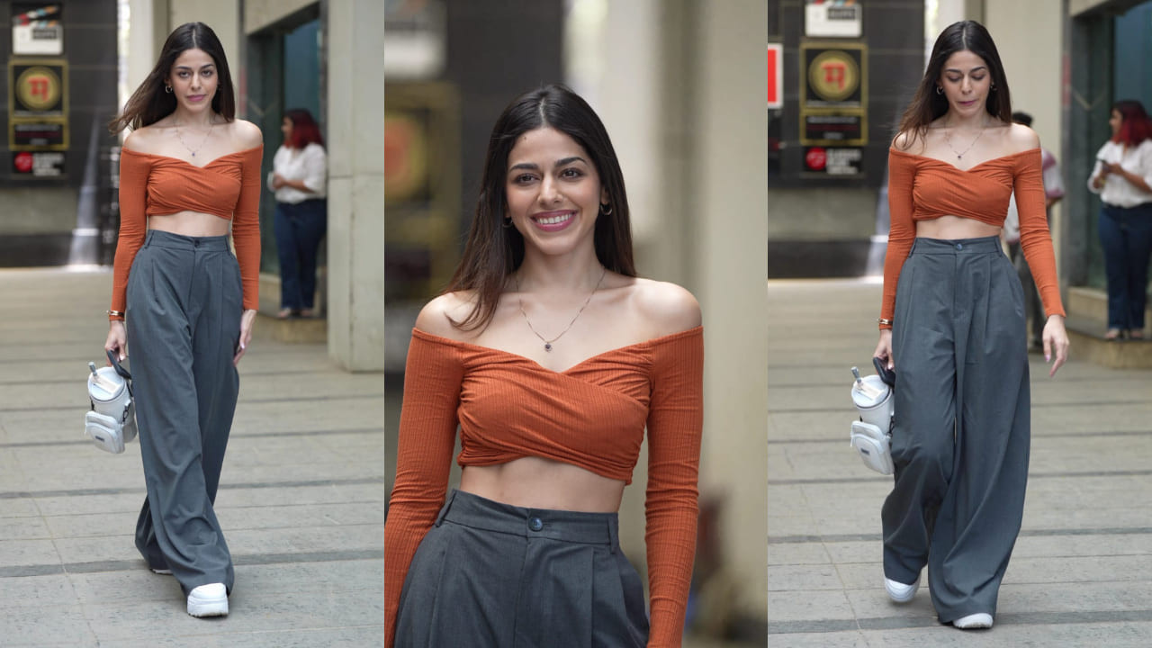 Alaya F masters office-to-party-ready look with orange crop top and formal pants