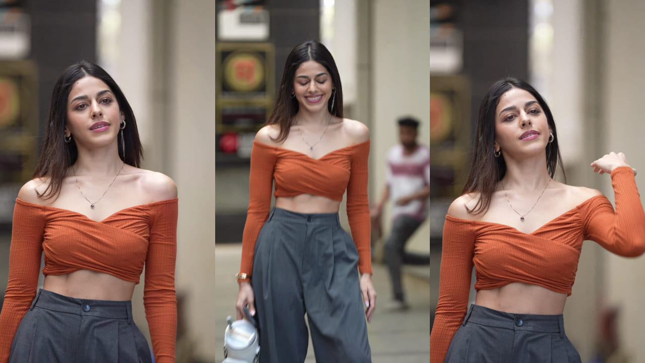 Alaya F masters office-to-party-ready look with orange crop top and formal pants