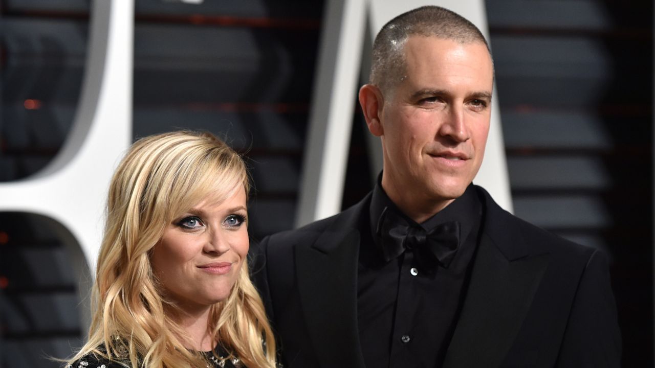 Reese Witherspoon and Jim Toth (via Getty Images)