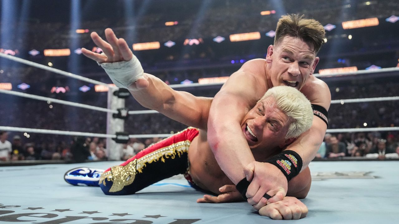 John Cena, Cody Rhodes: courtesy of Getty Images
