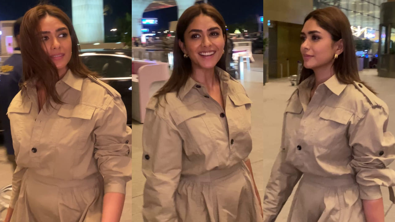 Mrunal Thakur pairs Rs 4,52,000 handbag with super elegant trench dress for her airport look. PC: Varinder