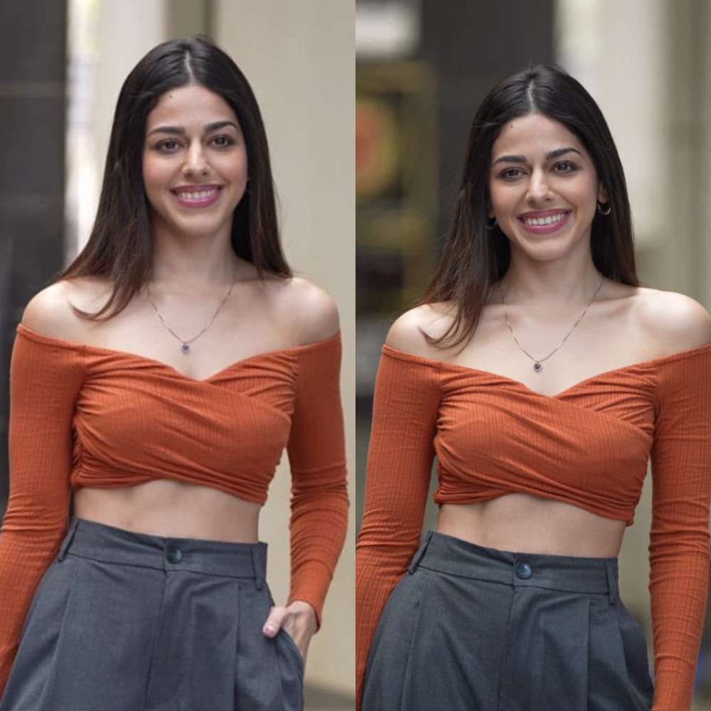 Alaya F masters office-to-party-ready look with orange crop top and formal pants
