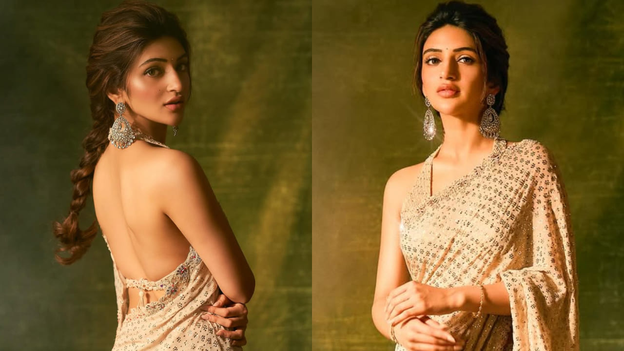 Sreeleela styles backless halter-neck blouse with ivory saree worth Rs 1,80,000 and it’s HOT. PC: Vijay Solanki
