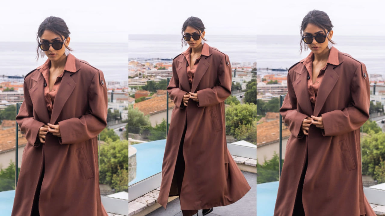Mrunal Thakur shows how to style trench coat with satin shirt and black formal pants for ultimate CEO vibes