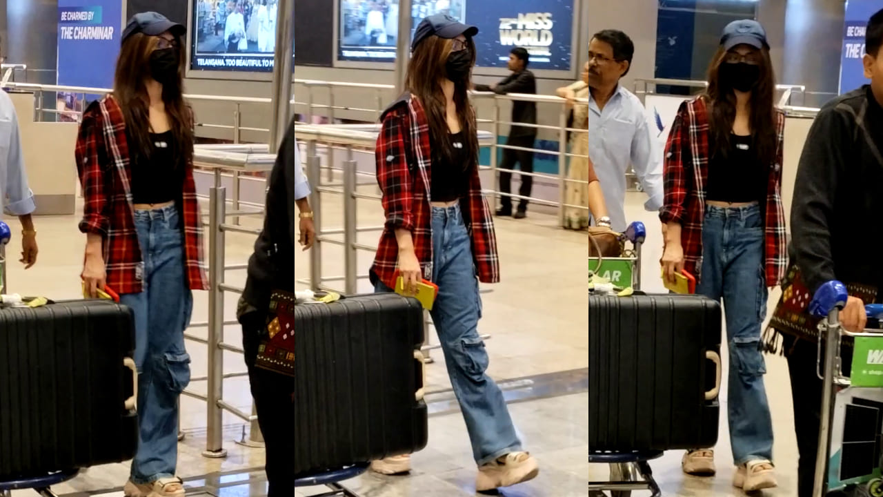 Sreeleela wears men’s hooded shirt with cool-girl fit for airport look, styles it effortlessly. PC: APH Images