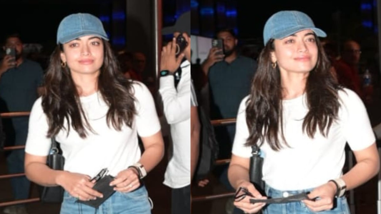 Rashmika Mandanna flaunts ‘not-so-basic’ denim look in straight-leg jeans and matching cap at airport (PC: Viral Bhayani) Rashmika Mandanna