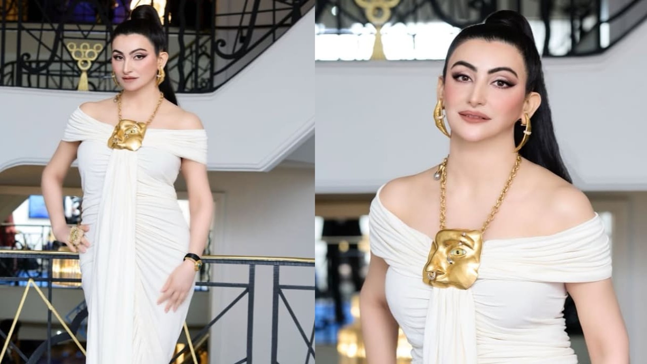 Cannes Film Festival 2025: Shalini Passi’s Rs 1,45,600 mouth-shaped earrings with off-shoulder white gown exudes Cleopatra energy. PC: Ryan Martis Shalini Passi