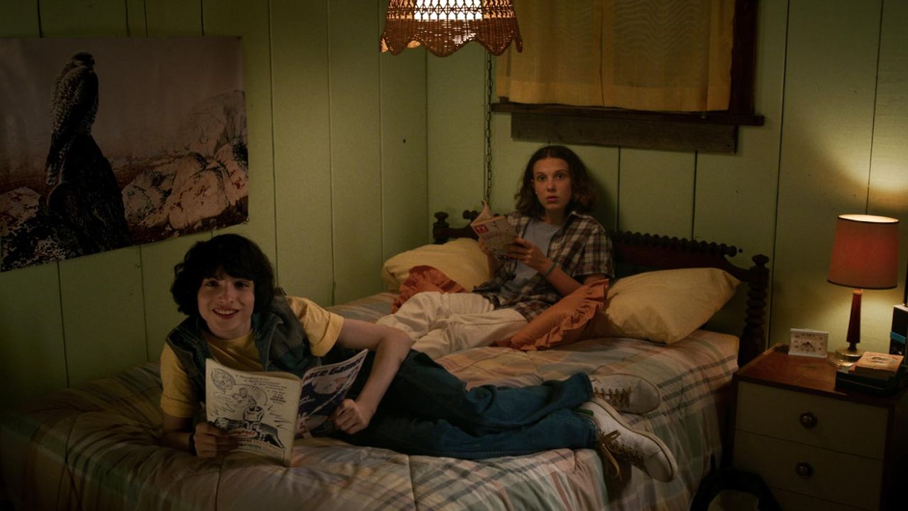 Finn Wolfhard and Millie Bobby Brown in Stranger Things (via IMDb)