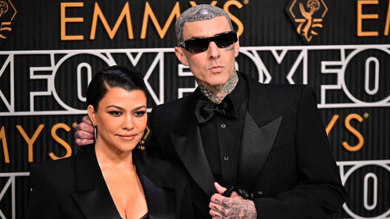 Travis Barker and Kourtney Kardashian (vis IMDb) Travis Barker and Kourtney Kardashian (vis IMDb)