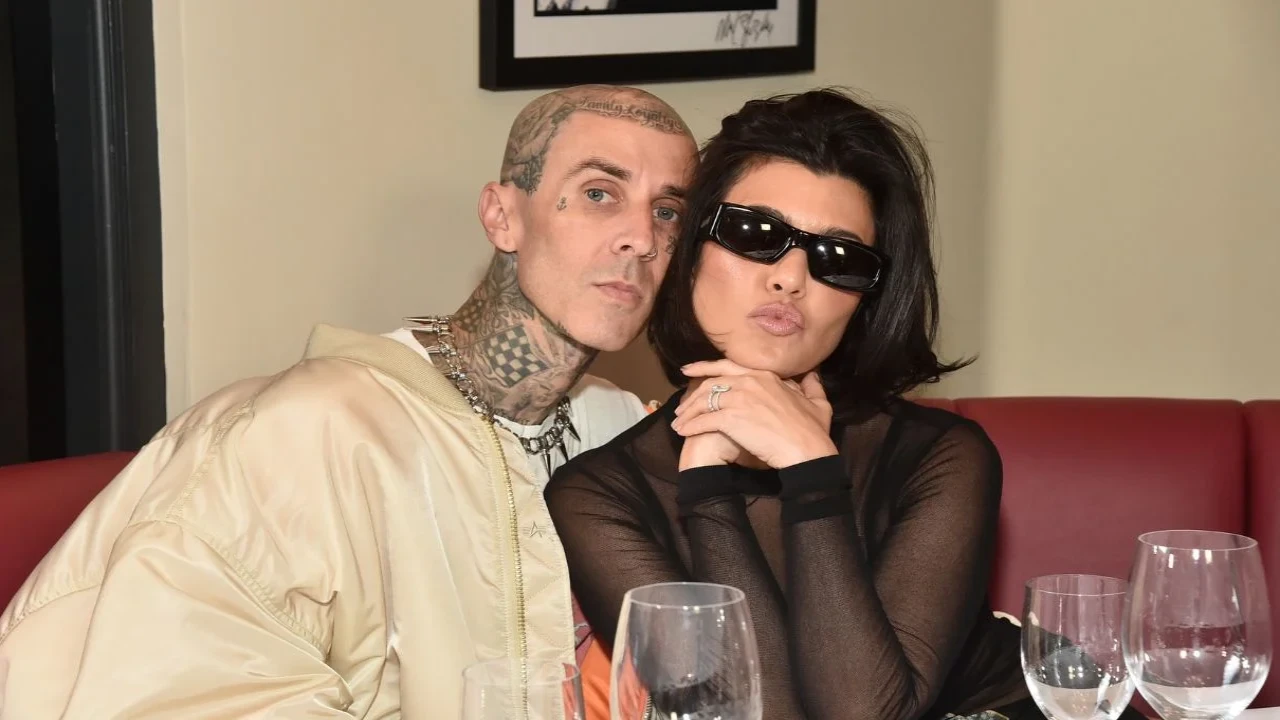 Travis Barker and Kourtney Kardashian (via Getty Images)