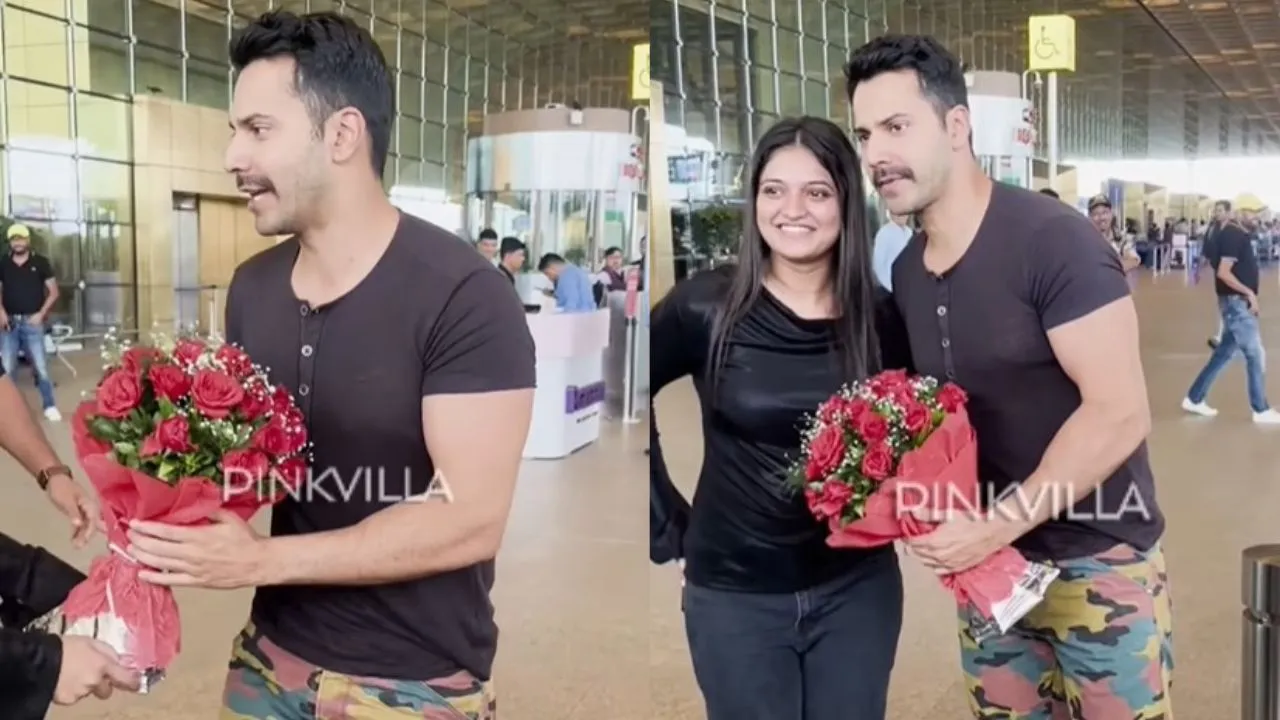 Varun Dhawan receives flowers at airport from a fan