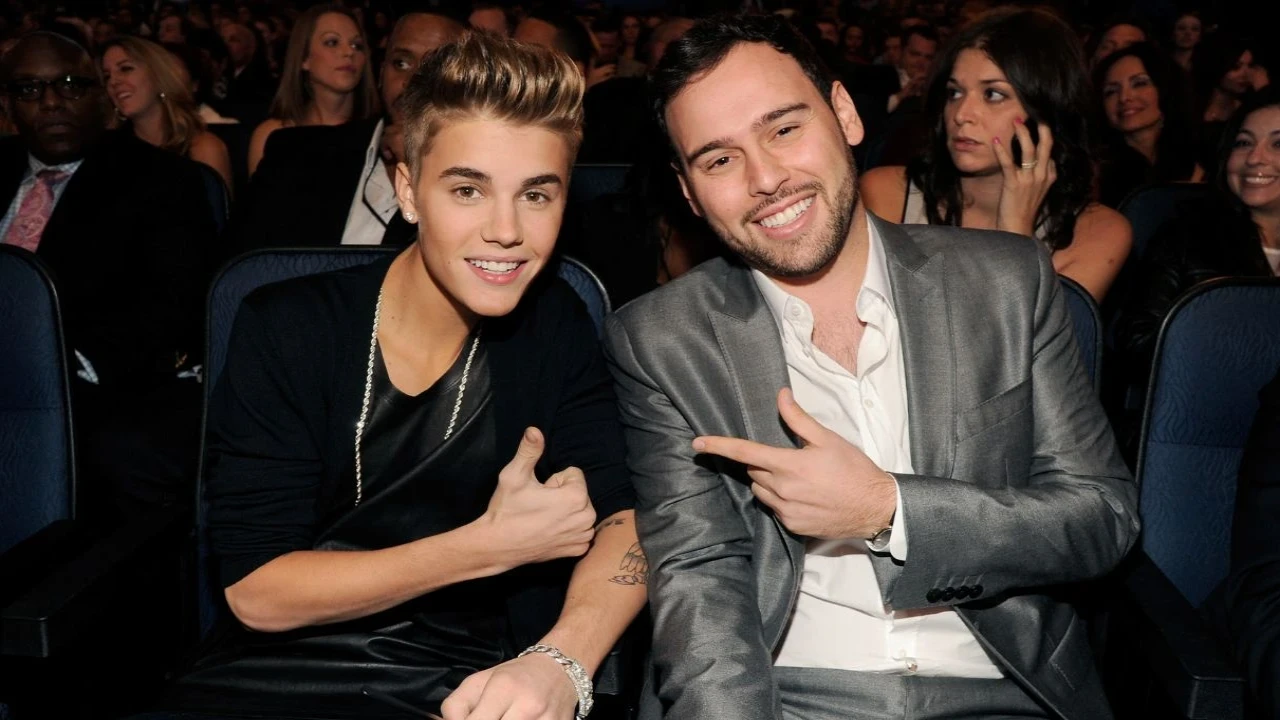 Justin Bieber and Scooter Braun: courtesy of Getty Images Justin Bieber and Scooter Braun: courtesy of Getty Images