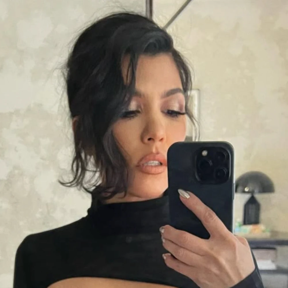 Kourtney Kardashian Shuts Down Pregnancy Rumors Amid Vacationing with Husband Travis Barker in Italy: ‘Living My Best…’