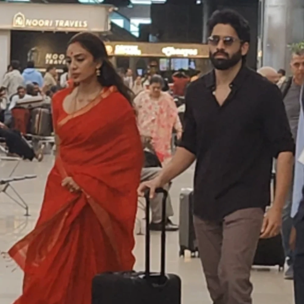 WATCH: Sobhita Dhulipala turns heads in red saree and sindoor at airport, returns from Tirupati with Naga Chaitanya