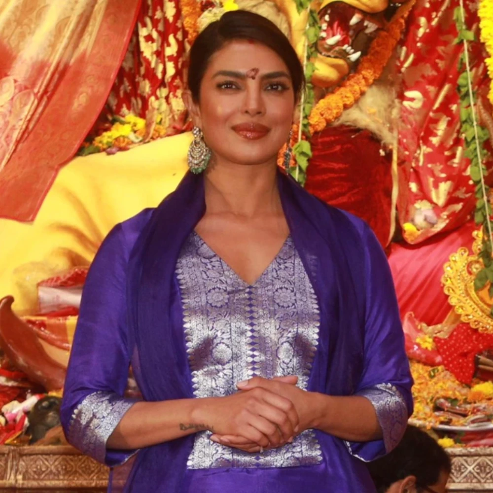 Priyanka Chopra flaunts her sindoor in blue outfit as she arrives at Kajol and Rani Mukerji's Durga Puja in Mumbai
