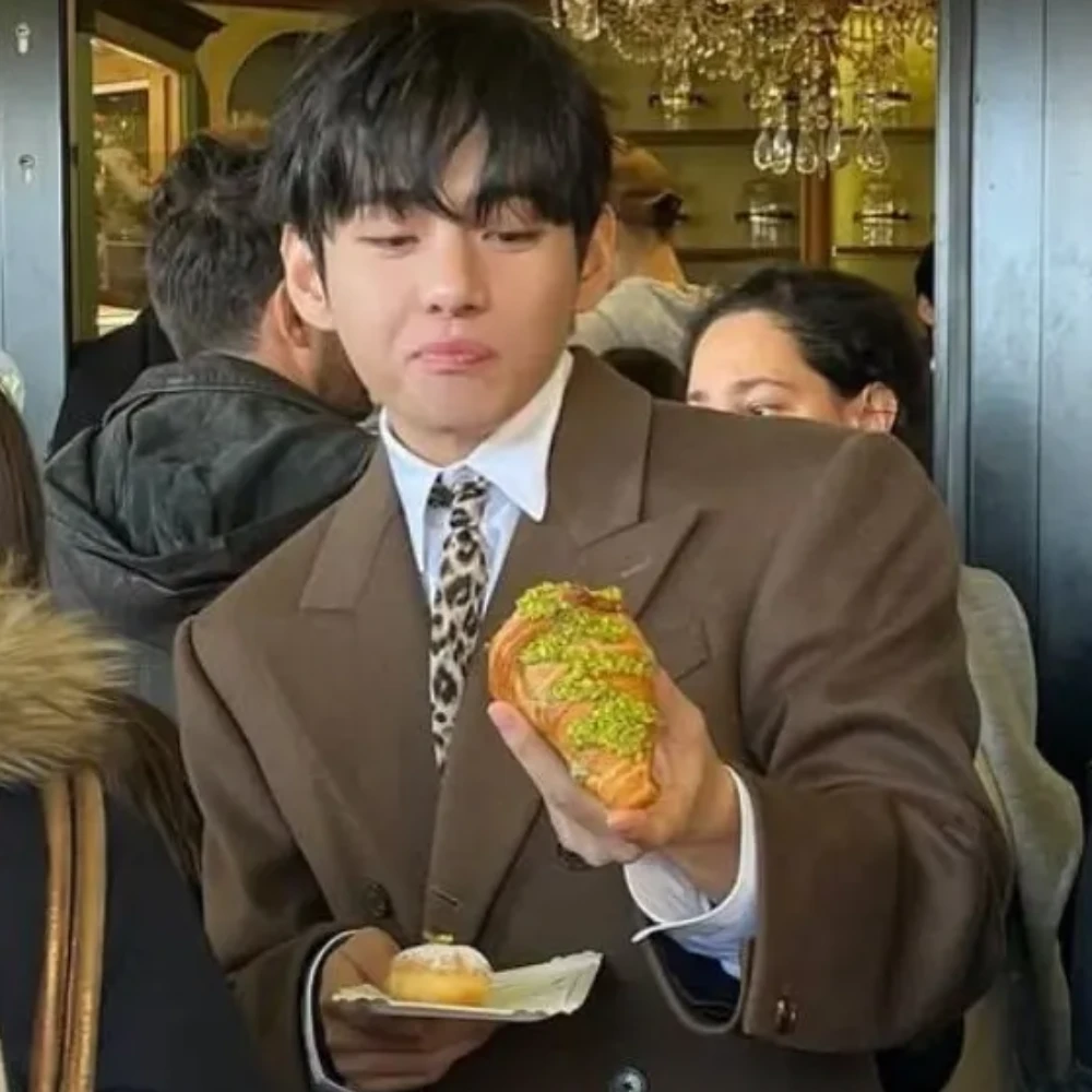 BTS’ V makes pistachio croissant place go viral after face stuffing moment during Paris Fashion Week