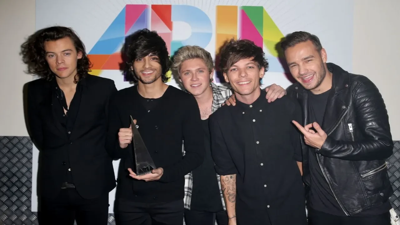 Louis Tomlinson, Zayn Malik: courtesy of Getty Images Louis Tomlinson, Zayn Malik: courtesy of Getty Images