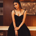 Mouni Roy looks bold and bow-tiful in a minimalistic head-to-toe black outfit with delicate updo