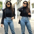Nora Fatehi gives the power dressing game a laid-back twist in Saint Laurent’s cropped blazer with rolled-up jeans