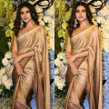 Mouni Roy enchants us with 24K magic in gold saree paired with potli bag and we can’t take our eyes off her