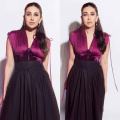 Karisma Kapoor’s pleated asymmetrical skirt is the classiest twist your summer outfits need