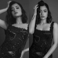Rashmika Madanna turns RETRO queen in Rs 2.25 lacs black sea coral-inspired gown, crimped hairstyle; We're in love