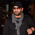 Arshad Warsi celebrates his birthday with paparazzi; WATCH as he engages in fun banter during cake-cutting