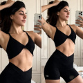 Alaya F blends in fitness and fashion for the weekend with her black bralette paired with biker shorts 