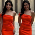 Alaya F's bright orange one-shoulder dress is capable of outshining even the sunset; take cues