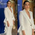 Sonam Kapoor serves dramatic flair in white pantsuit with ruffled sleeves but her arm candy worth over Rs 3 lacs steals attention