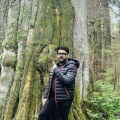 Kapil Sharma poses with a 400-year-old tree as he admires nature during his vacation  