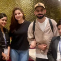 Anushka Sharma-Virat Kohli happily pose with Mumbai airport staff as they jet off for T20 World Cup; PIC