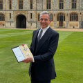 Disney’s CEO Bob Iger Receives Title Of Honorary Knight Bestowed By Queen Elizabeth II; Prince William Leads Ceremony