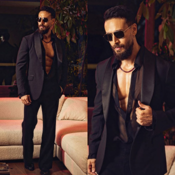 Tiger Shroff is absolute HOTNESS in all-black suit styled with see-through shirt at Pinkvilla Screen and Style Icons 2025