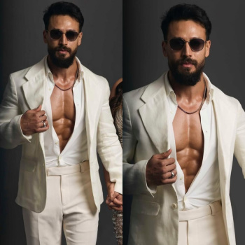Tiger Shroff flaunts his abs in barely buttoned white shirt and blazer look, it's too hot to handle