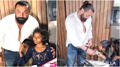 PICS: Bobby Deol helps underprivileged kids and poses with them after attending Alanna Panday's baby shower