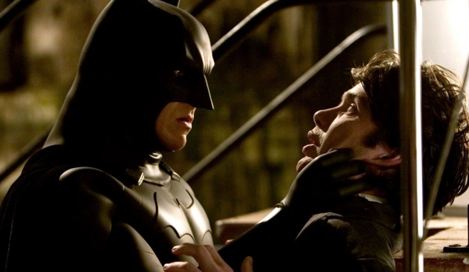 Cillian Murphy and Christian Bale in Batman (Credits: Warner Bros)