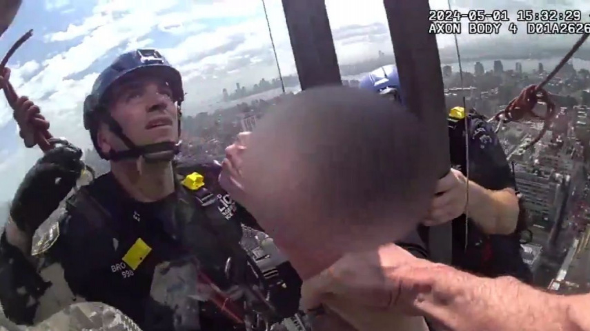 Rescue of a woman on ledge of 54-storey building goes viral